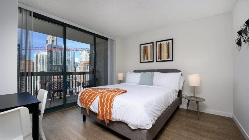 Cozy one bedroom at Cozy River North Studio with views of Chicago's skyscrapers