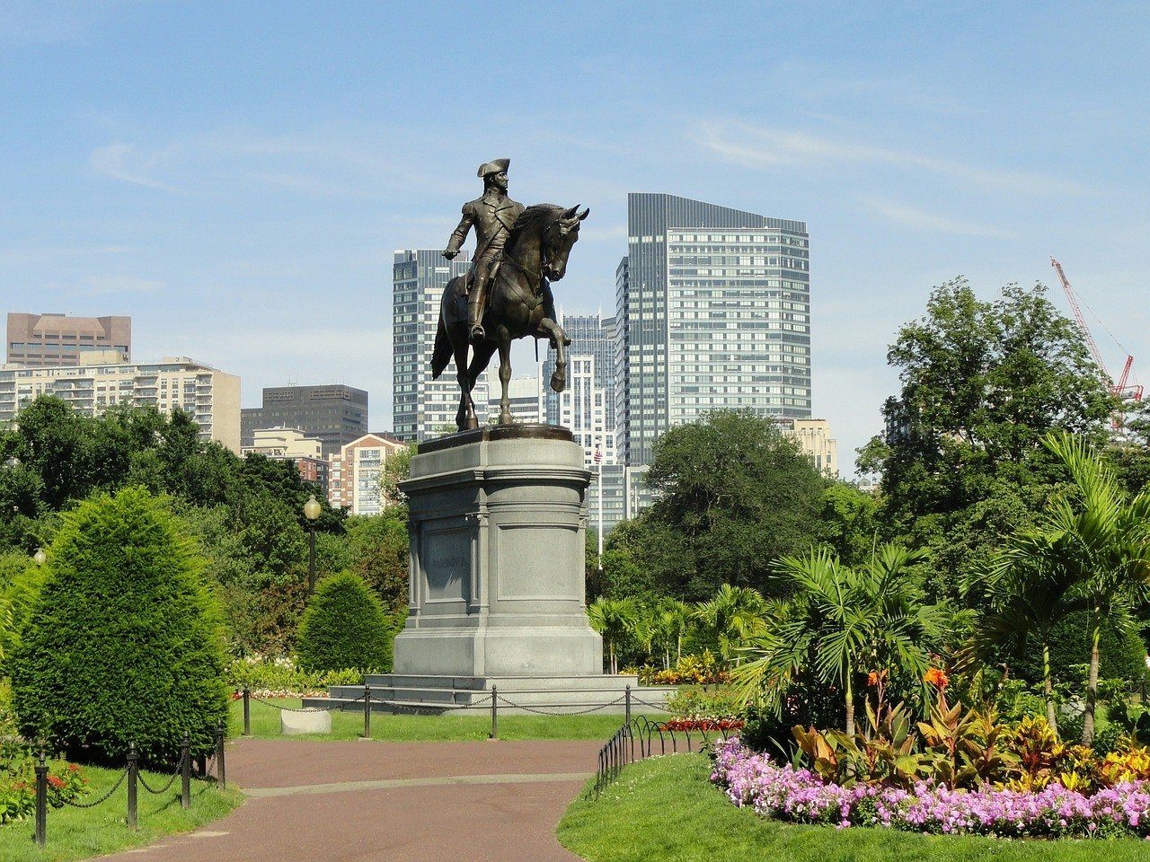 boston commons park with historical statue in the summer
