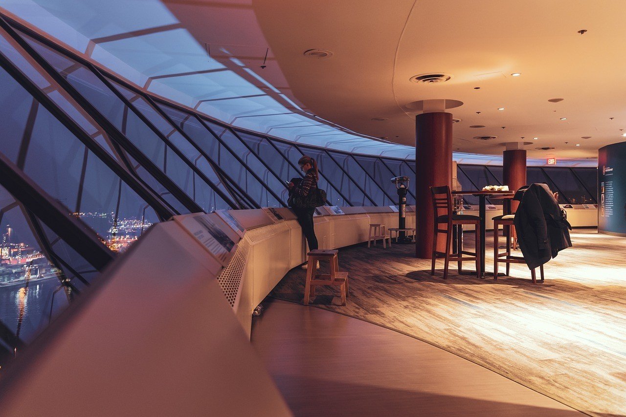 person looking inside vancouver lookout