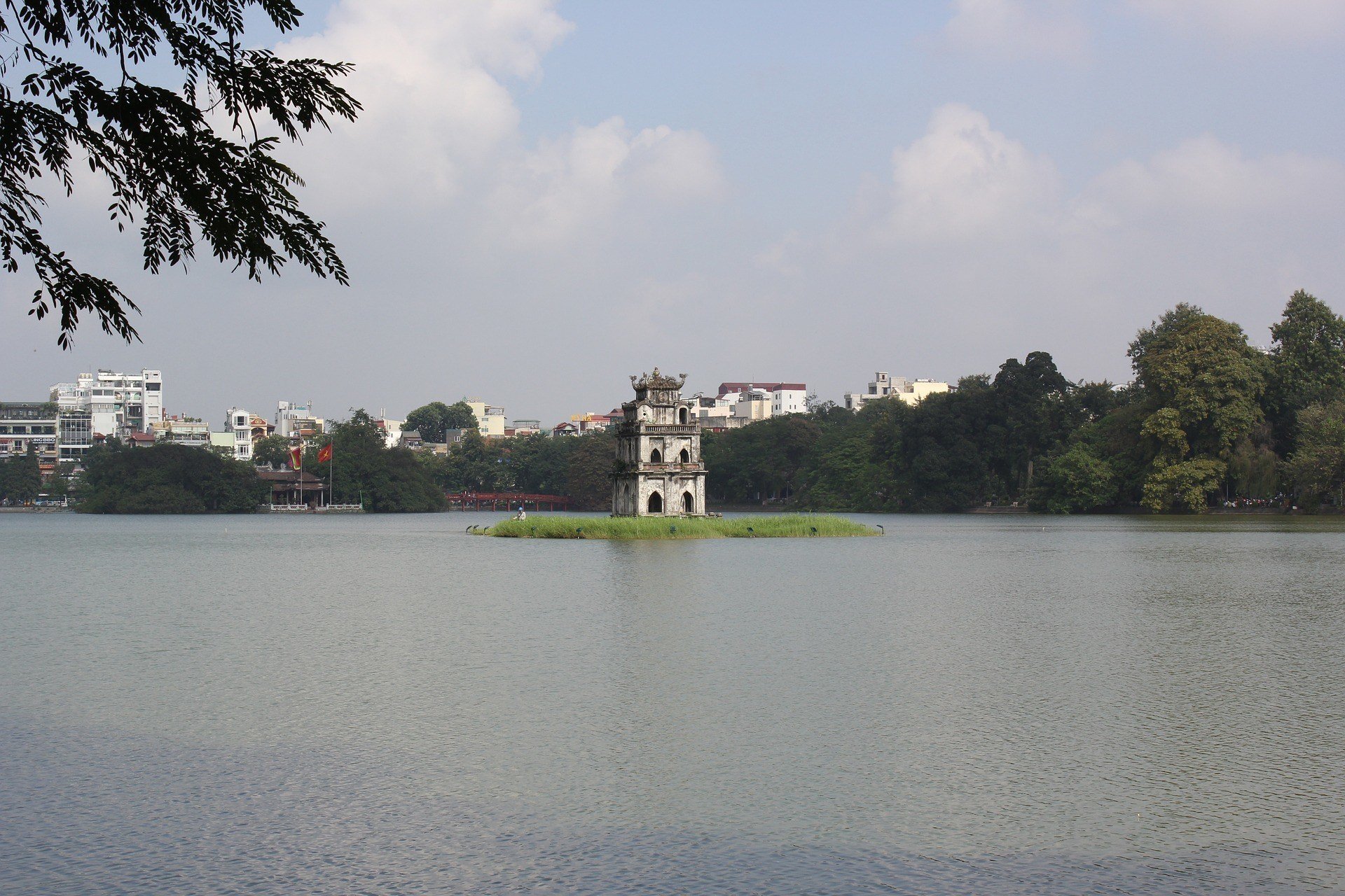 Hoan Kiem Lake Hanoi with turtle tower sitting in the middle