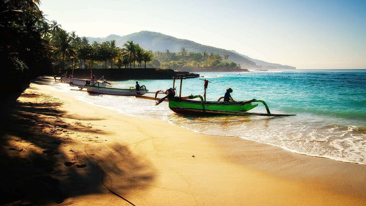 bali safe to visit boats on the beach