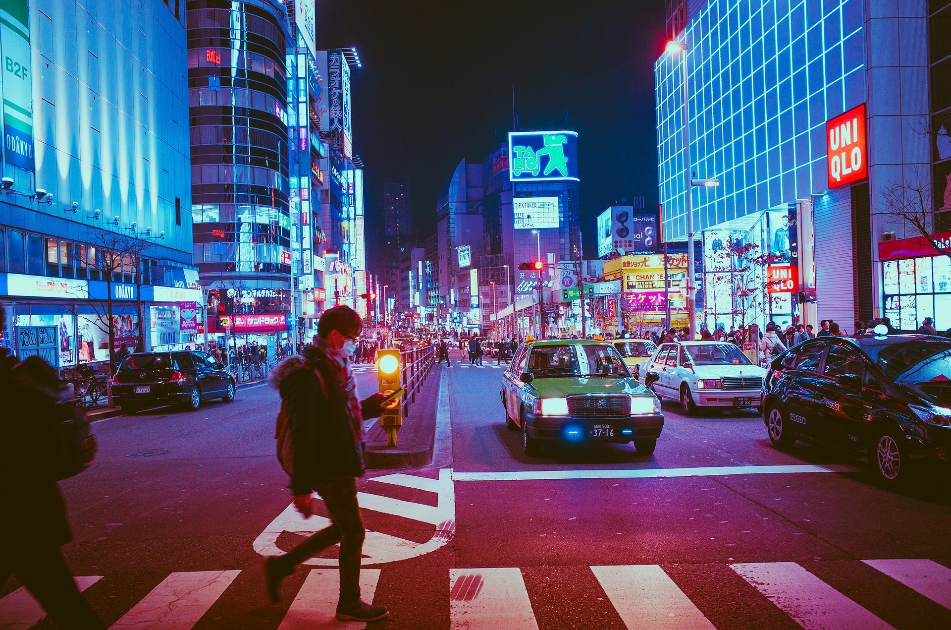 A busy city road in Japan with taxis