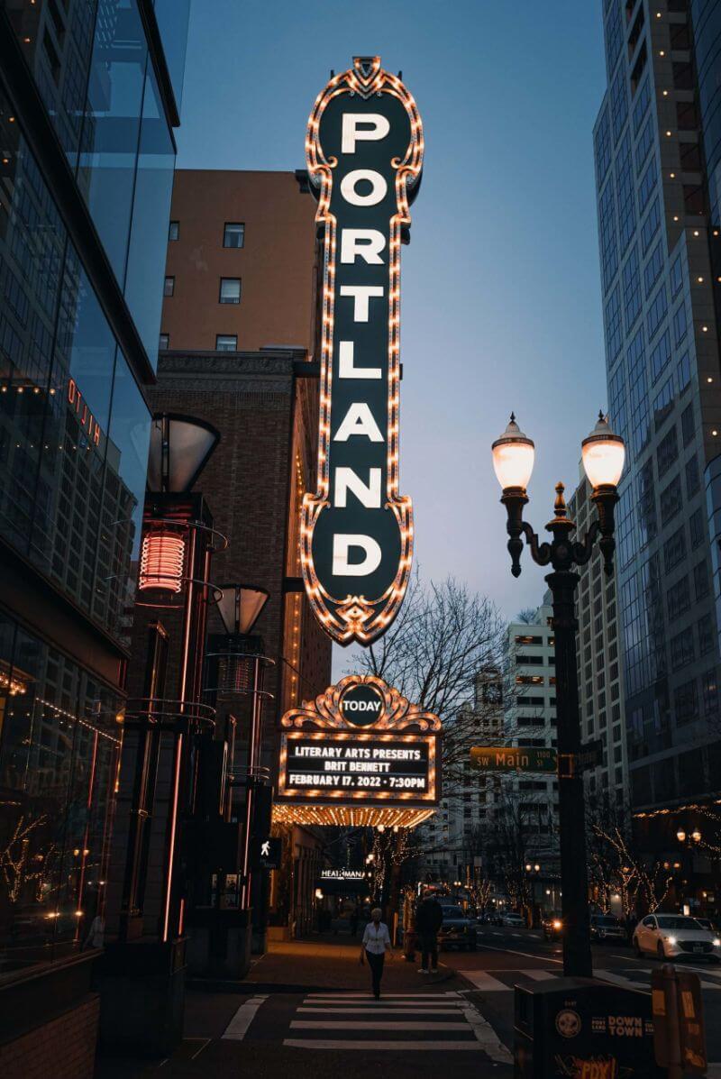 portland sign lit up at dusk