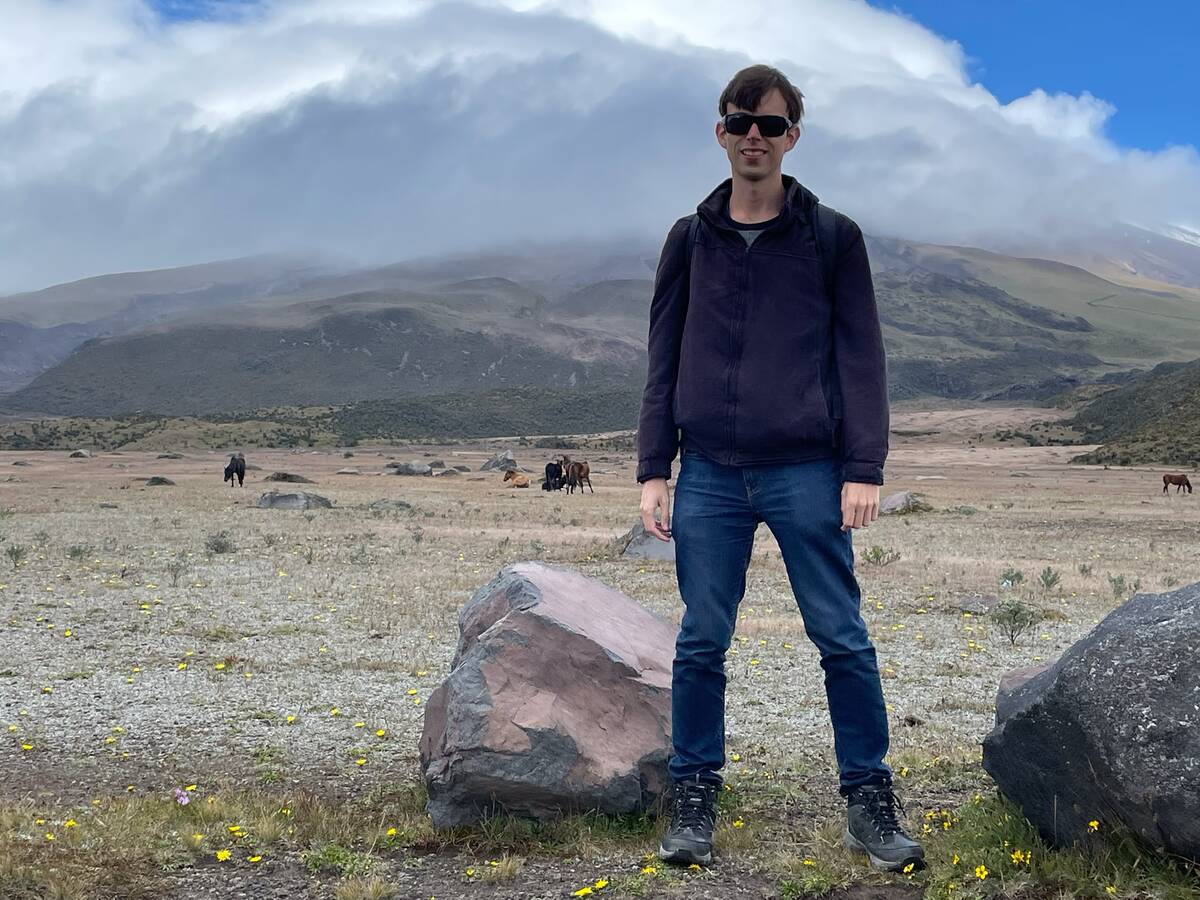 Alex at a fog-covered Cotopaxi Volcano in Ecuador.