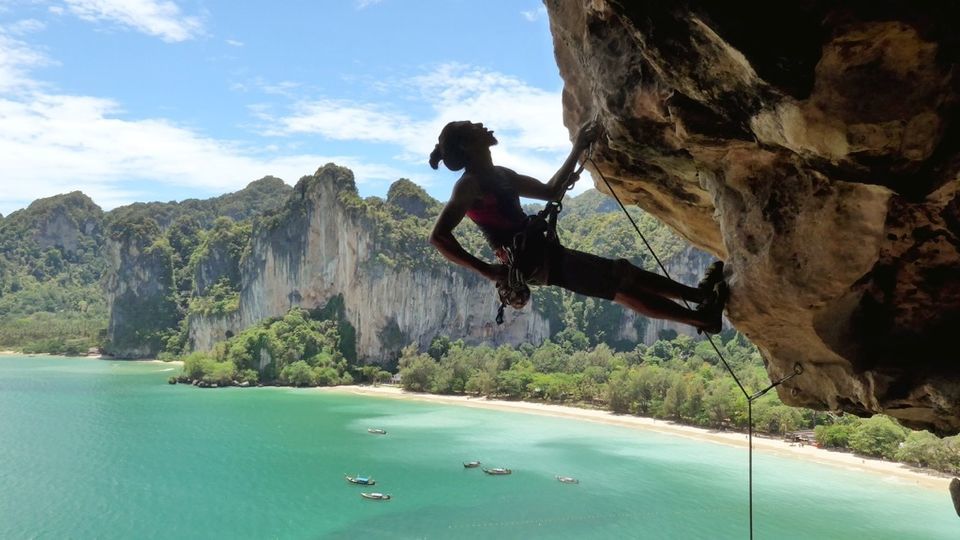 Man climbing with his gift gadgets