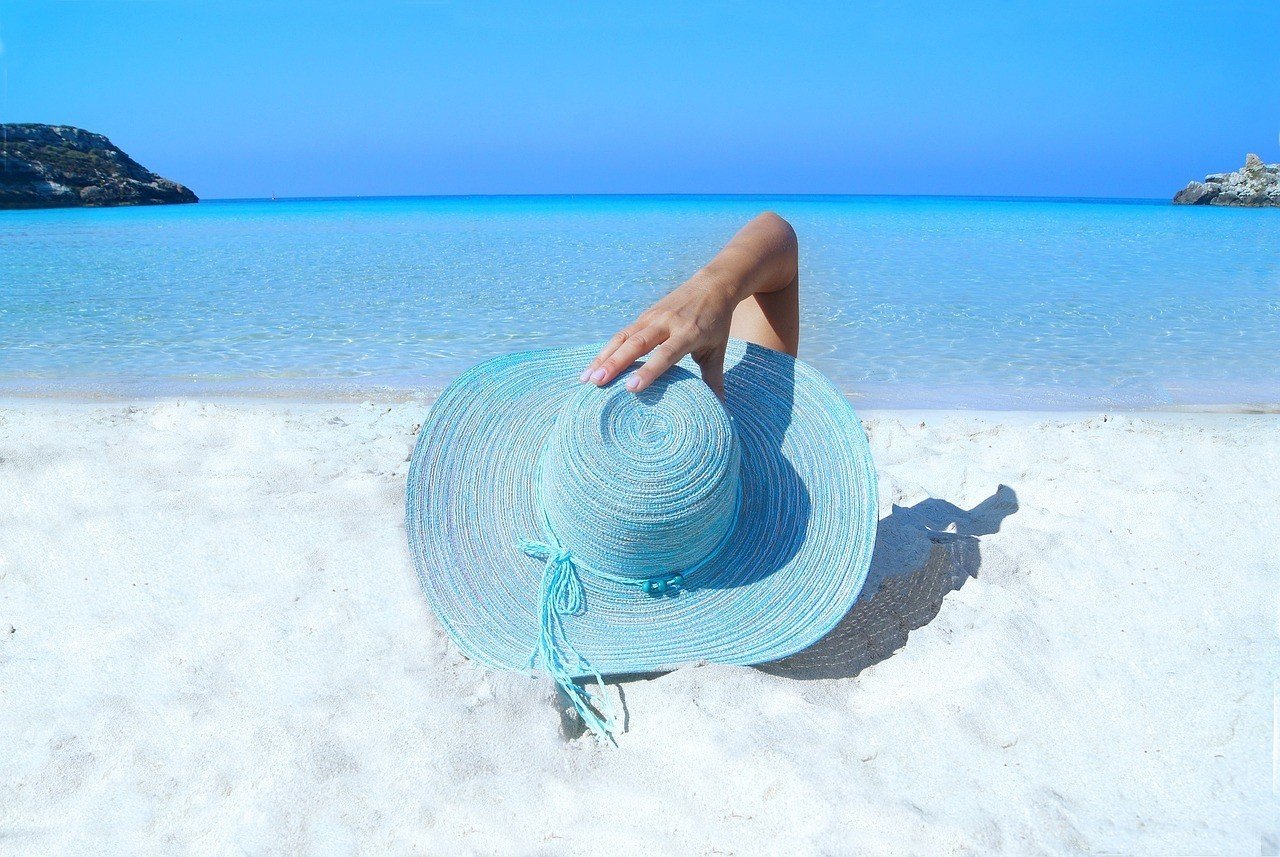 lounging on a beach blue