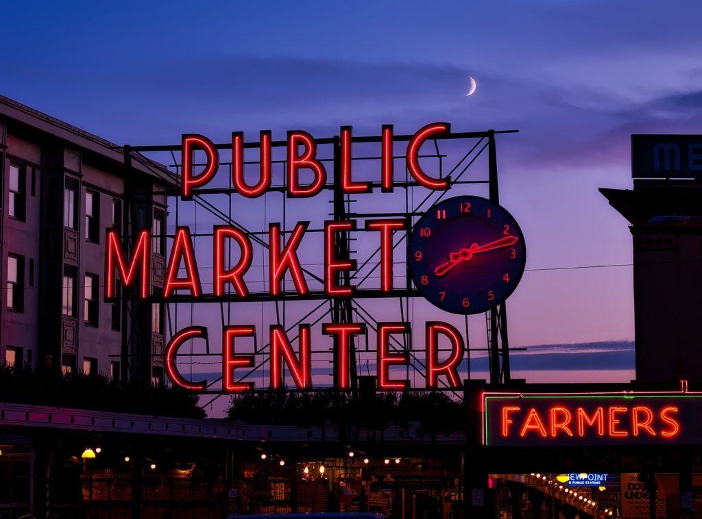 Pike Place Market lit up sign post