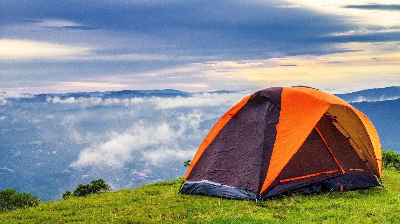 Camping tent for backpacking over a beautiful valley