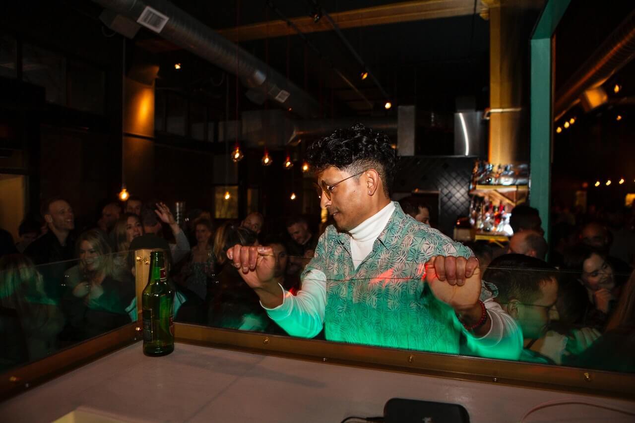 Man dancing at a Mauritius nightlife venue