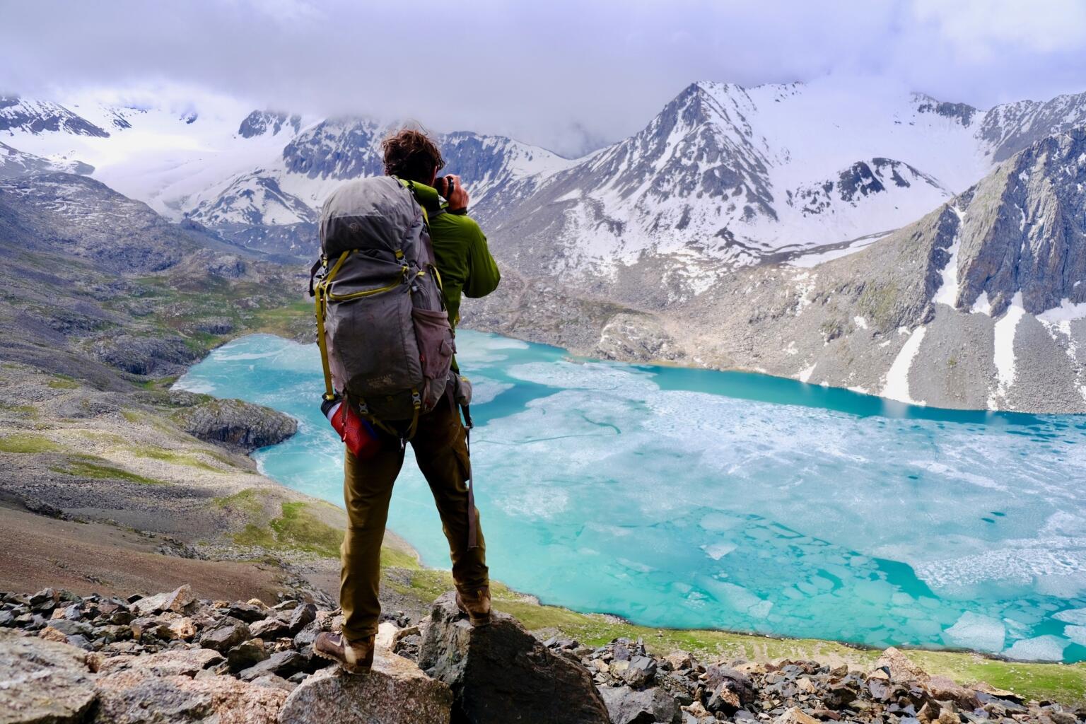 taking a photo on a hike ala kul kyrgyzstan