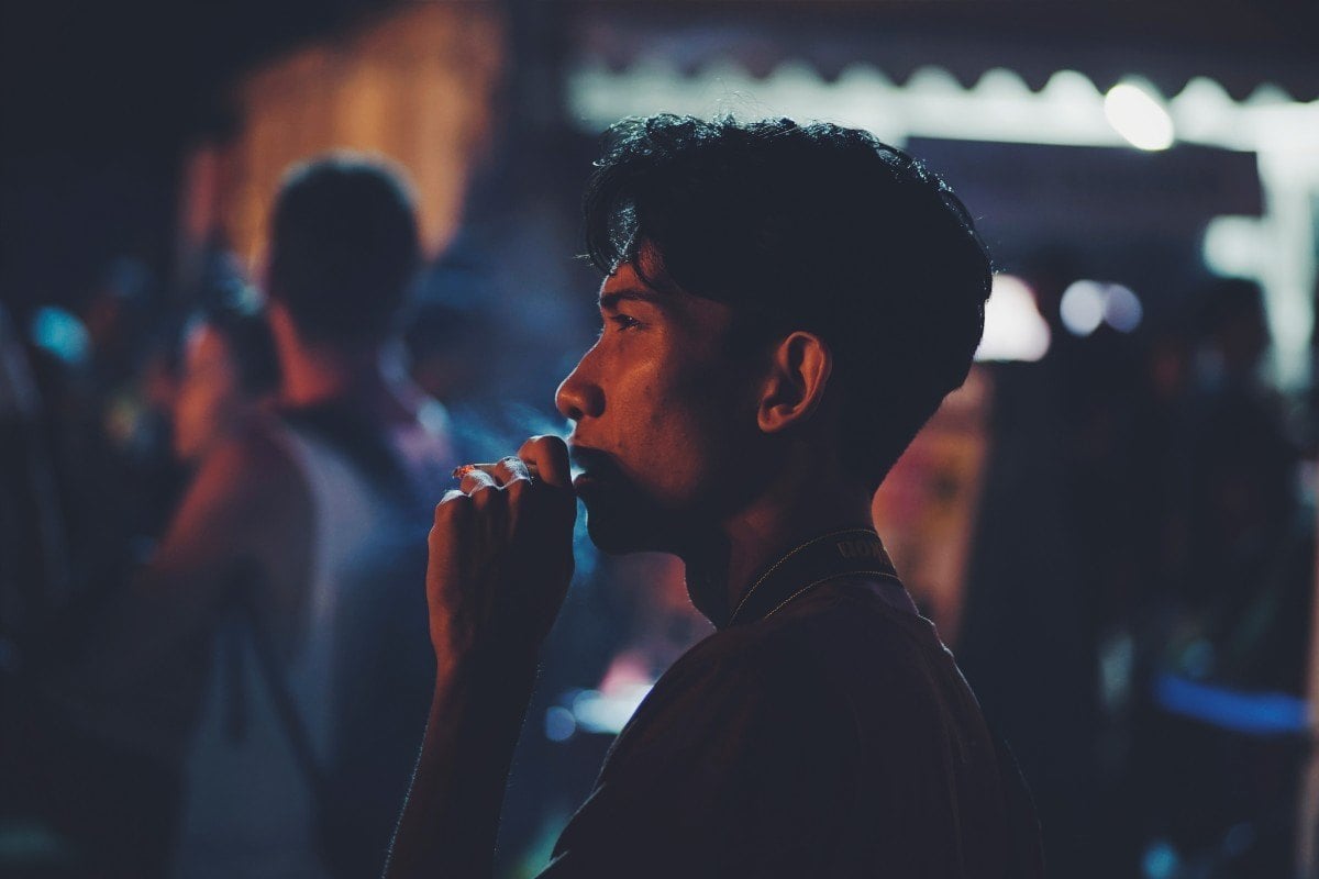 man smoking in bali