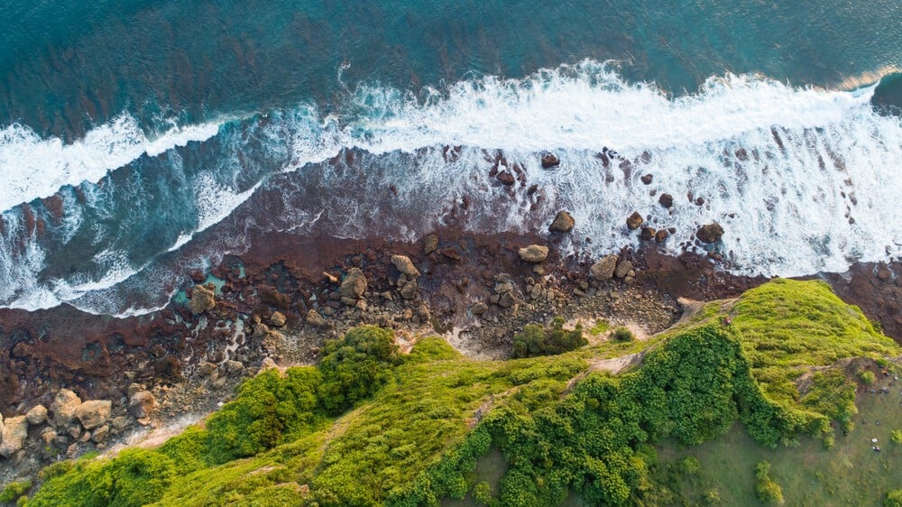 drone shot karang boma cliff uluwatu