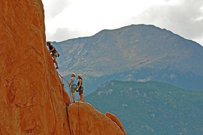 Rock Climbers with their cool gifts on a wall