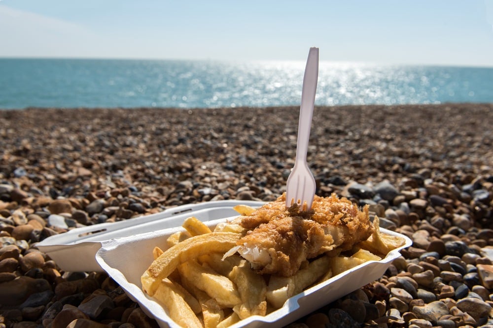 Eating fish and chips at a beautiful beach in Australia.