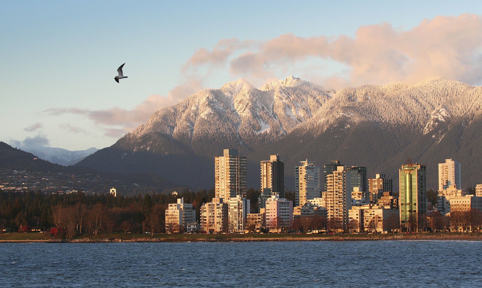 West End, Vancouver view across the water, skyline and huge mountains behind