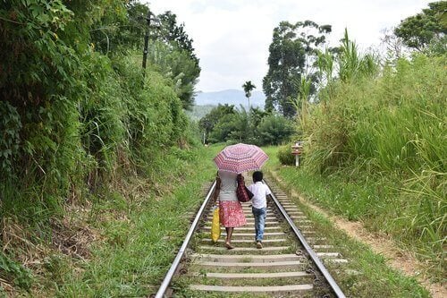A mother and child dodge Sri Lanka's train ticket prices