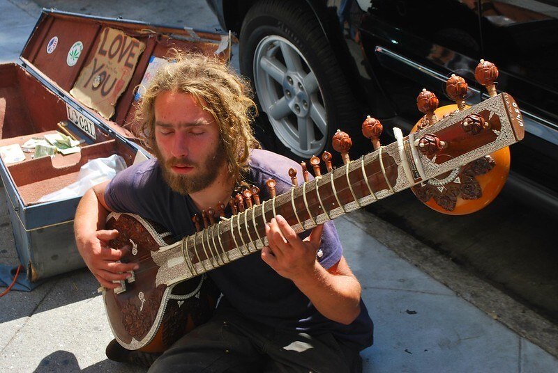 Hippy busker who gets heaps of travel sex