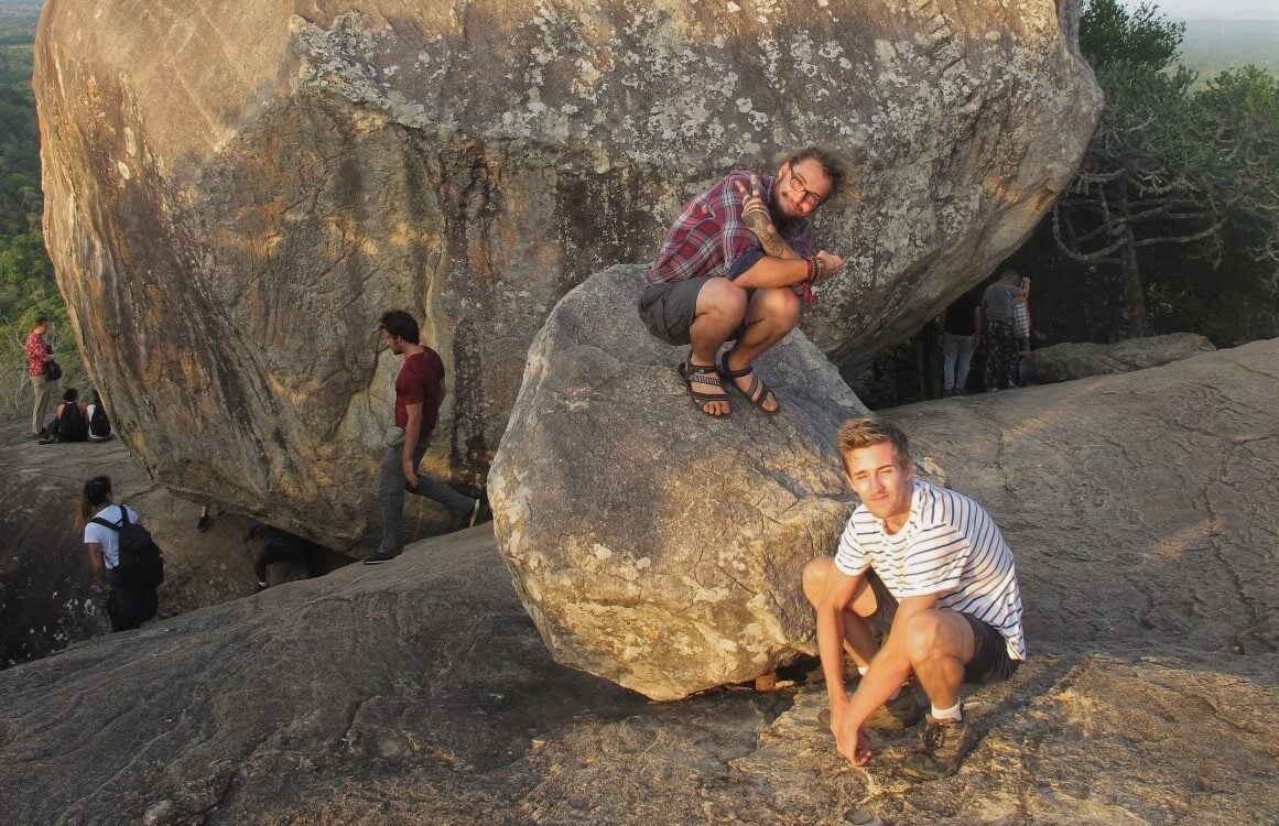 Two white boys being gansta at a place to visit in Sri Lanka