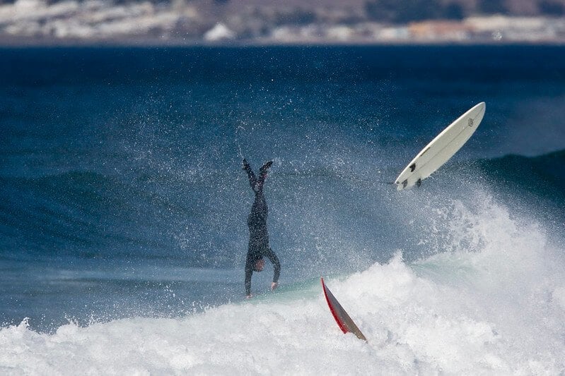 Dude stacks riding Sri Lanka's waves