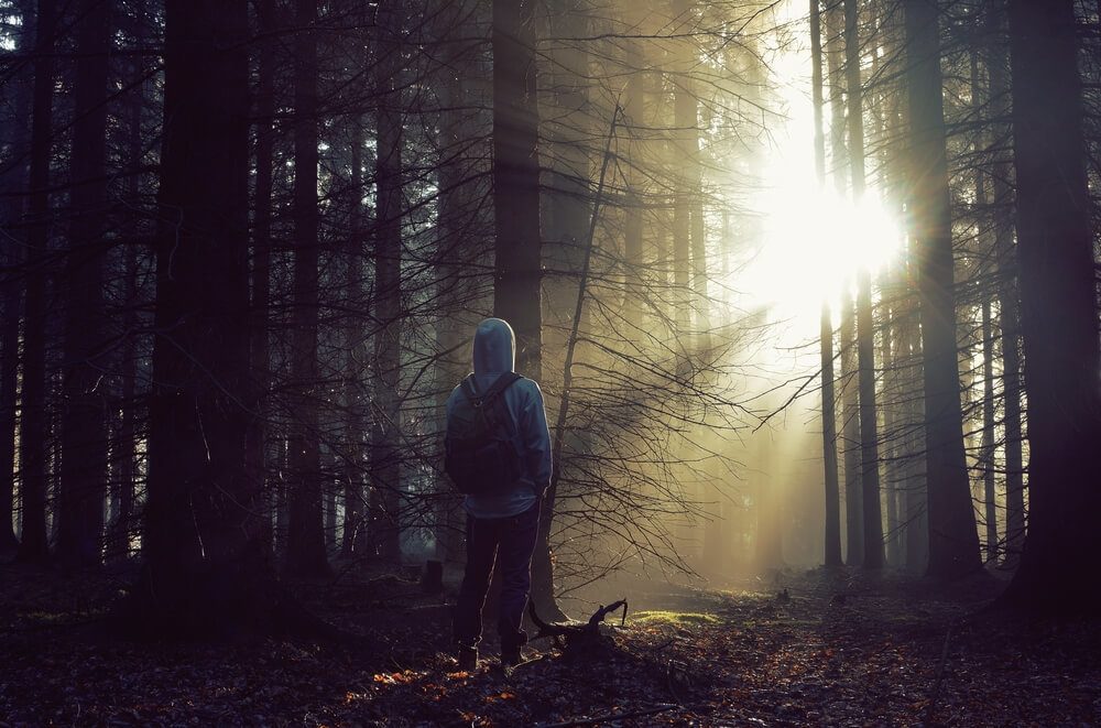 Man leaving the woods 