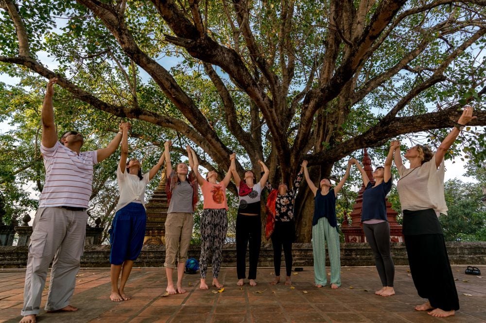 Spiritual group in Angkor Wat in a yoga retreat