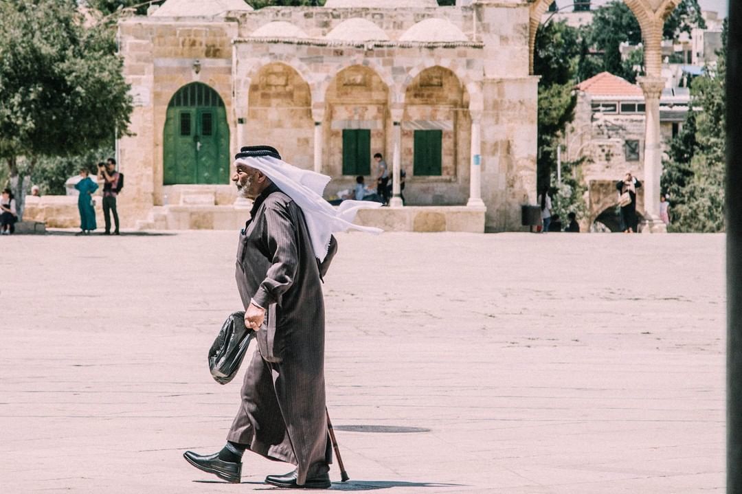 Muslim man taking a walking tour in Jerusalem