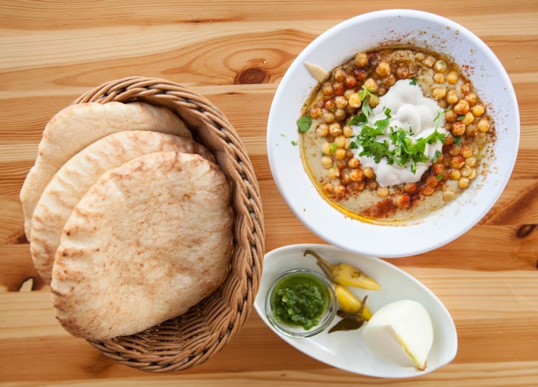 Big plate of Israel food and hummus