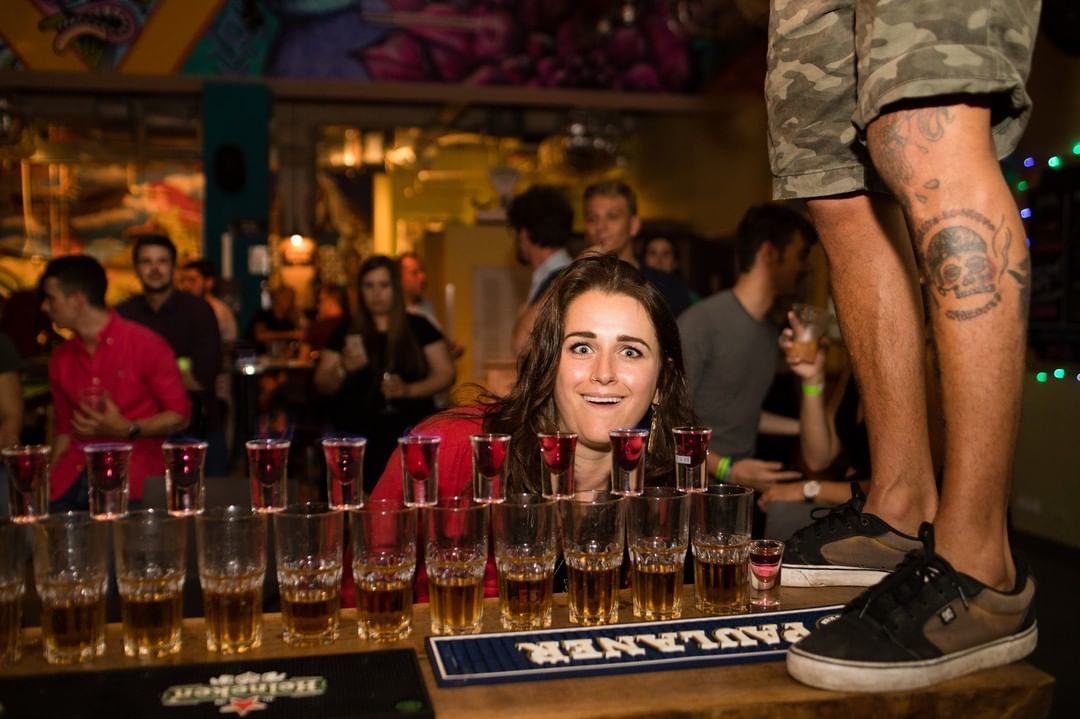 Woman preparing for the night in a party hostel