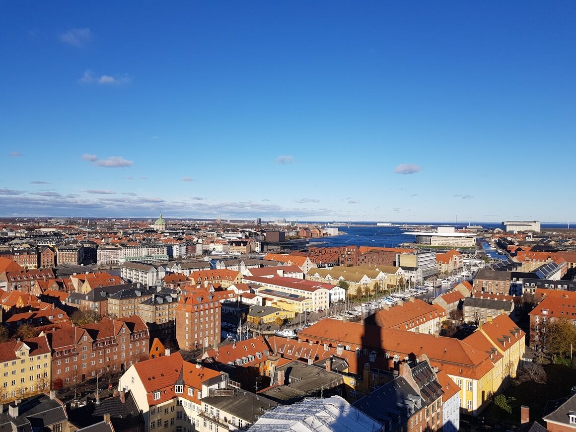 View over Copenhagen skyline with clear blue skies