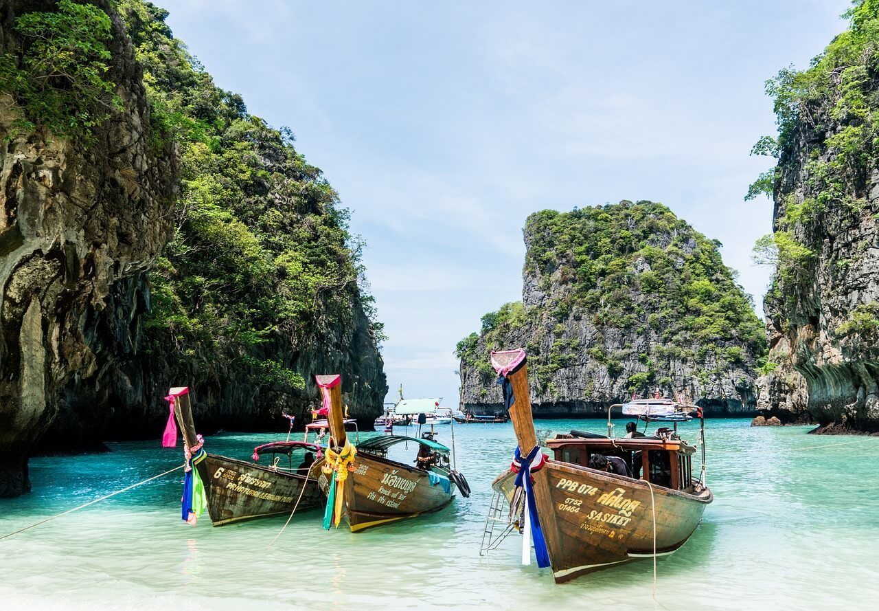 Longboats at a tropical beach in Phuket, Thailand