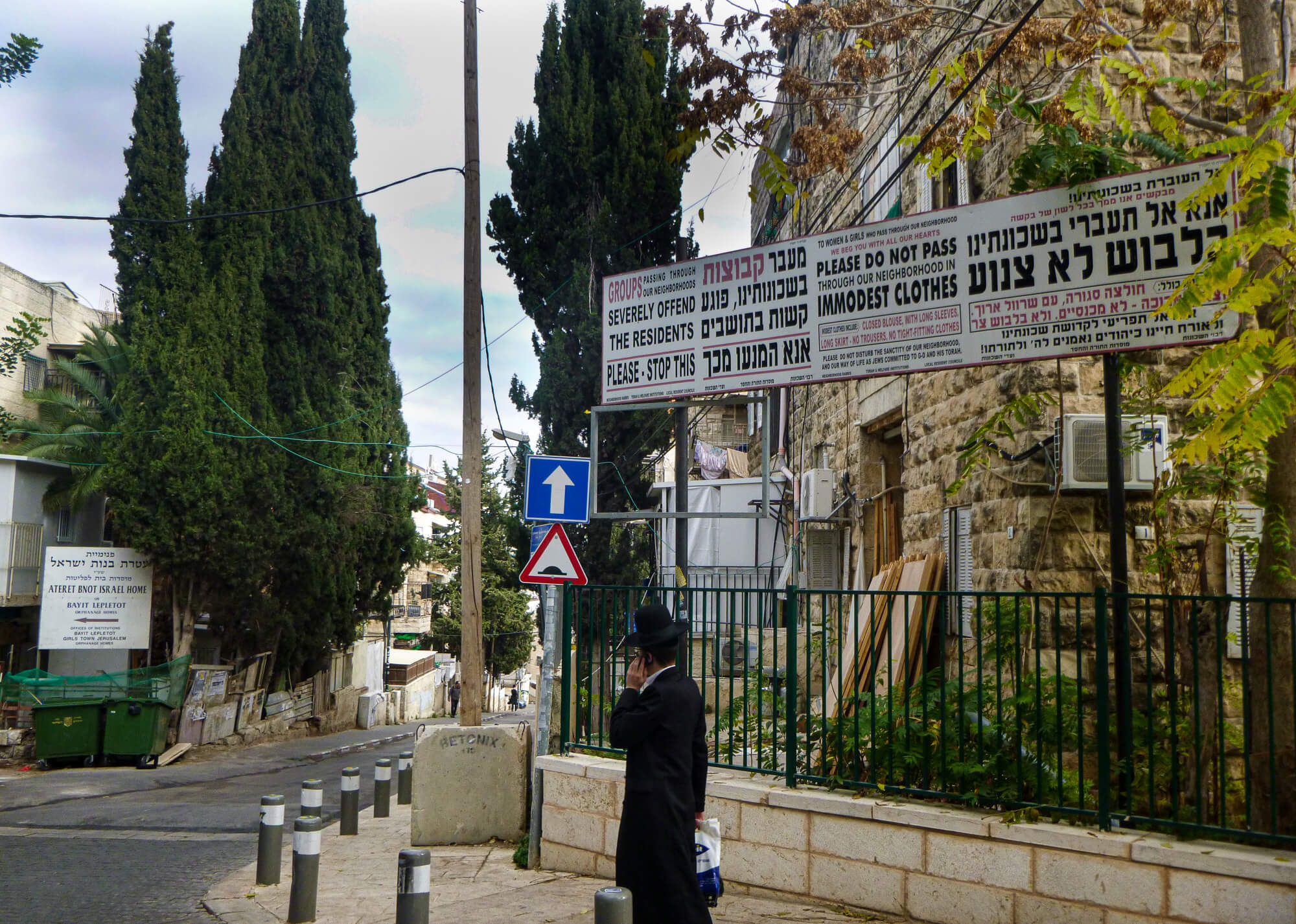 Tourist in Jerusalem talks on the phone in Israel