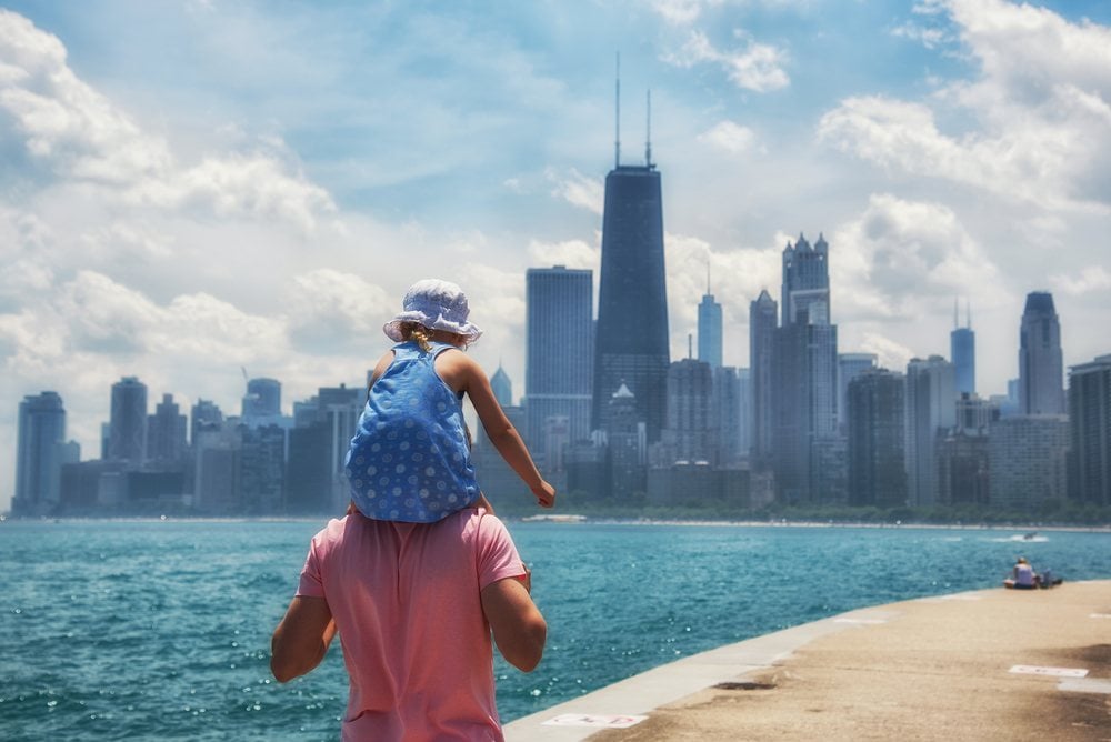 A family visiting chicago down by the water