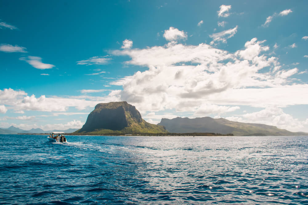 Diving tour boat in front of Le Morne in Mauritius