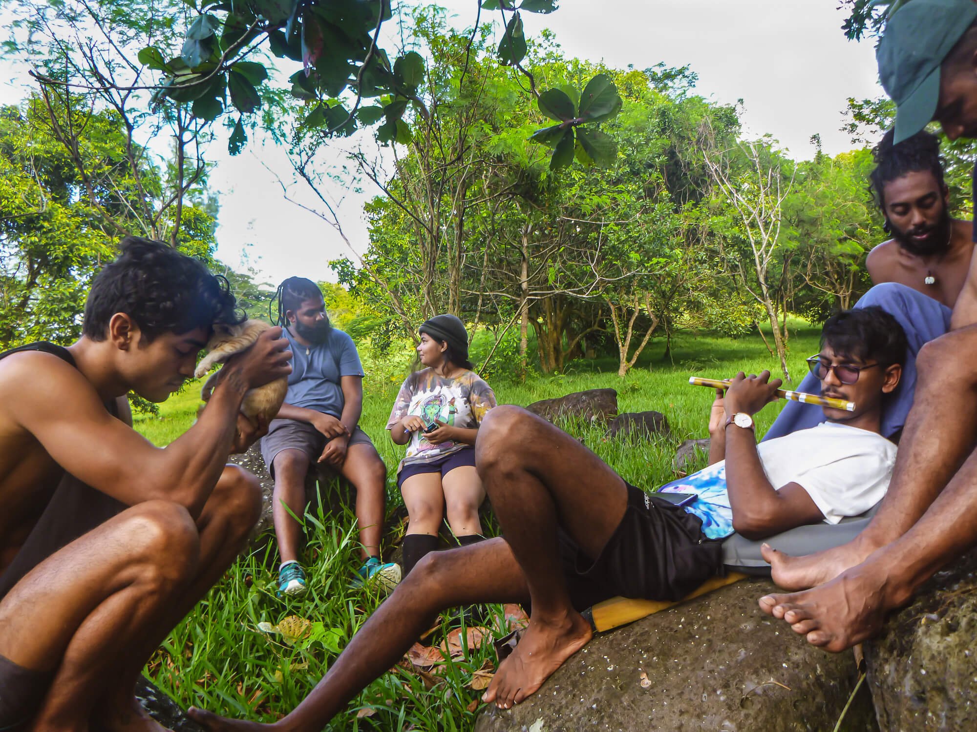 Group of Mauritius young people chill and wonder what to do