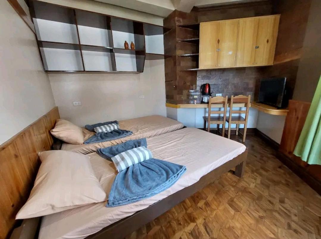 simple room in a transient house baguio