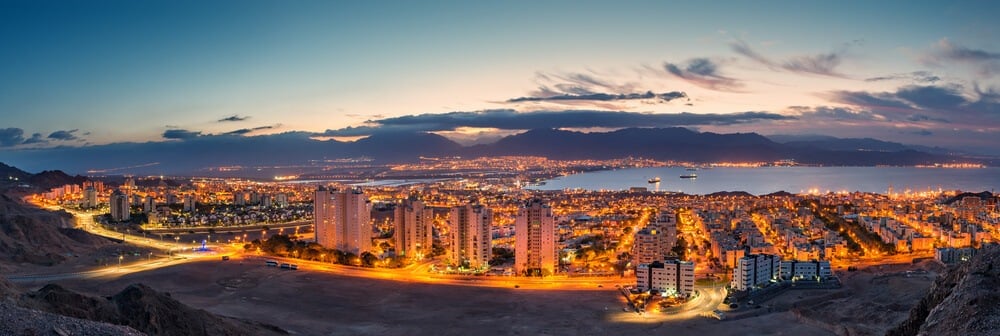 Aerial photo of Eilat's city lights and the Red Sea