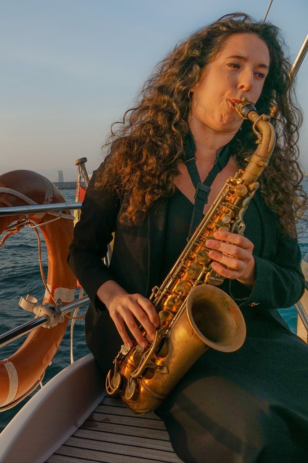 Experience Live Sax and Sunset Sailing