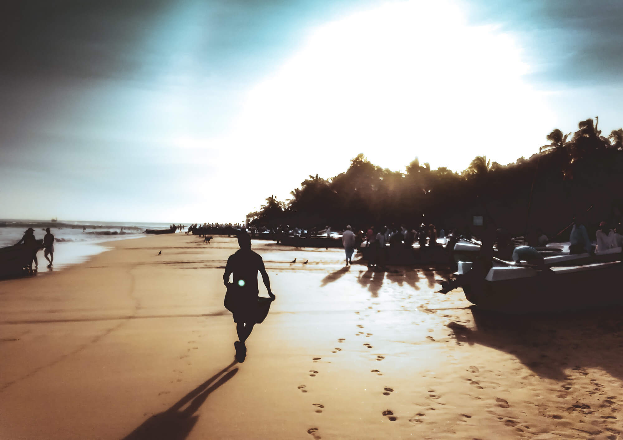 Local on a beach in Sri Lanka skipping with excitement