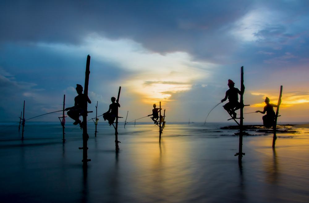 Photographing the famous stilt fishermen while on a tour of the south Sri Lanka coast