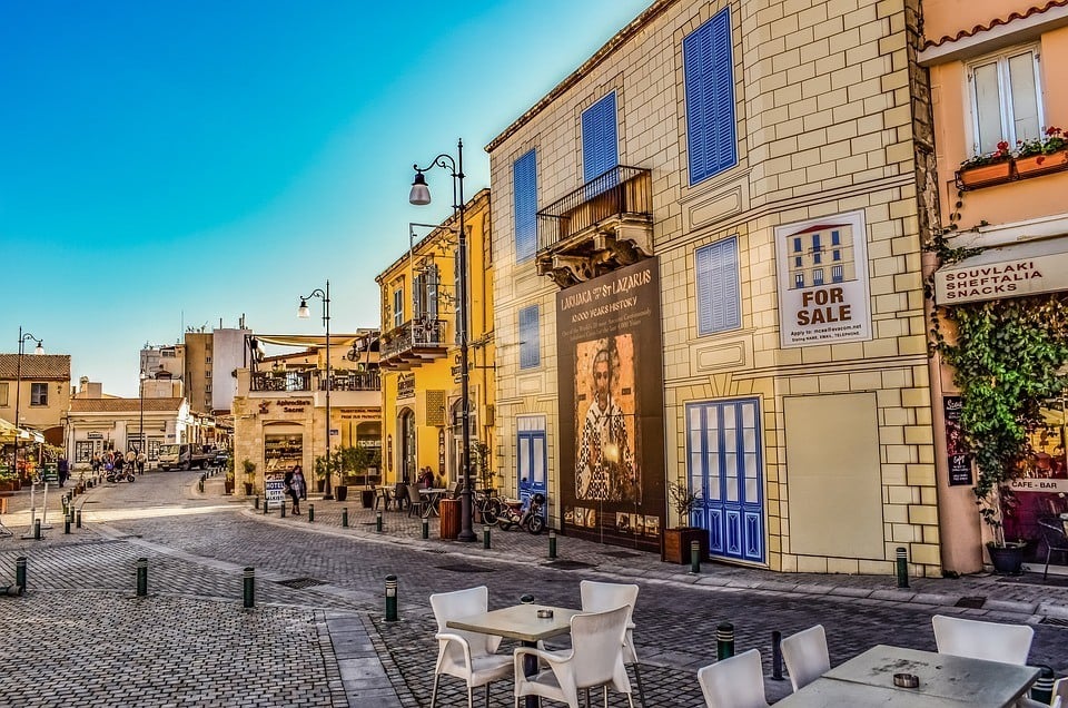 a cobblestone street in Larnaca, Cyprus on a sunny blue sky day