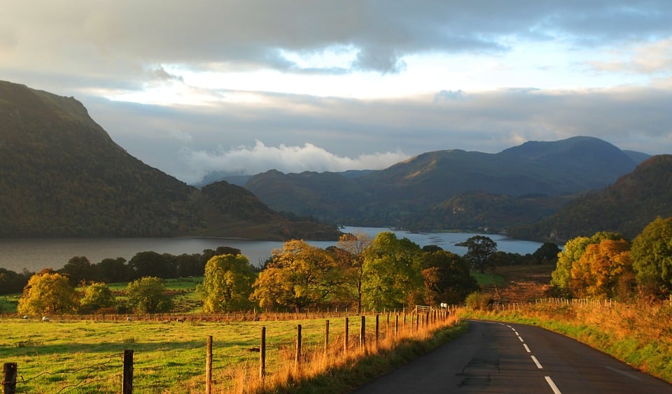 A stunning view of woodland fells while hiking in the Lake District