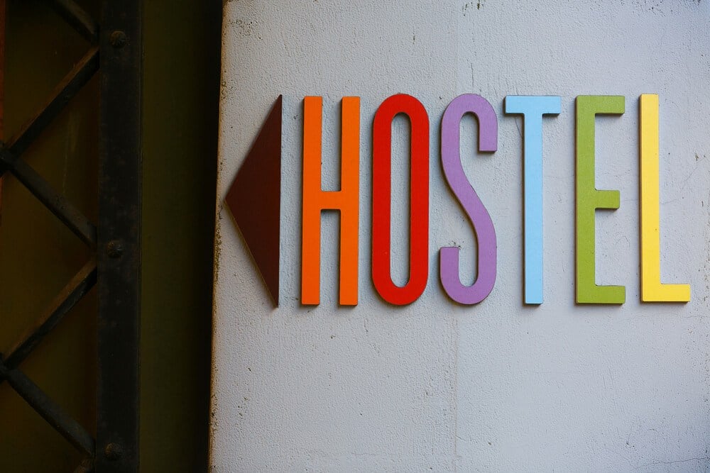 Multi-coloured welcome sign at one of the best hostels in the world