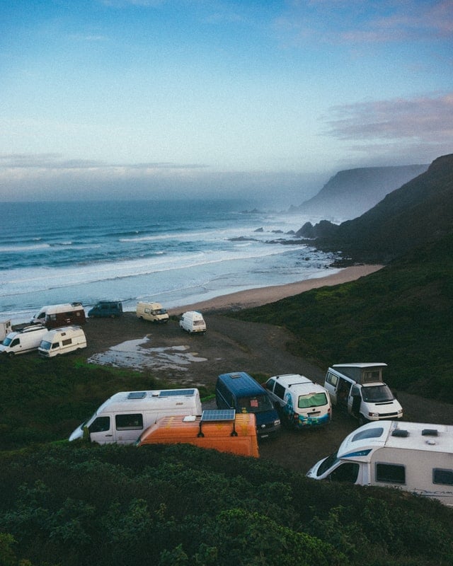 Selection of different types of RVs parked at a campground