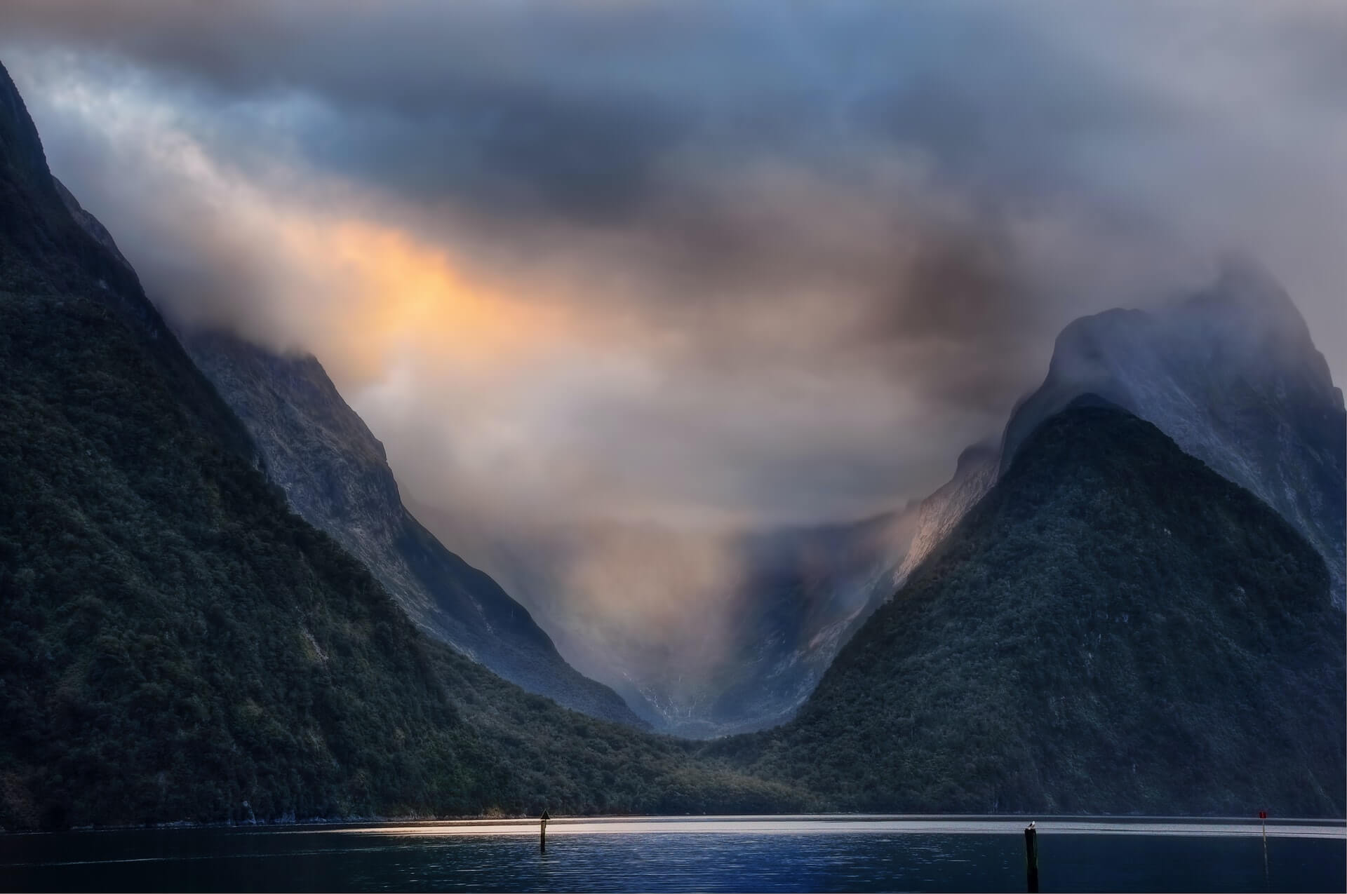 Kayaking in Milford Sound on a moody and overcast day