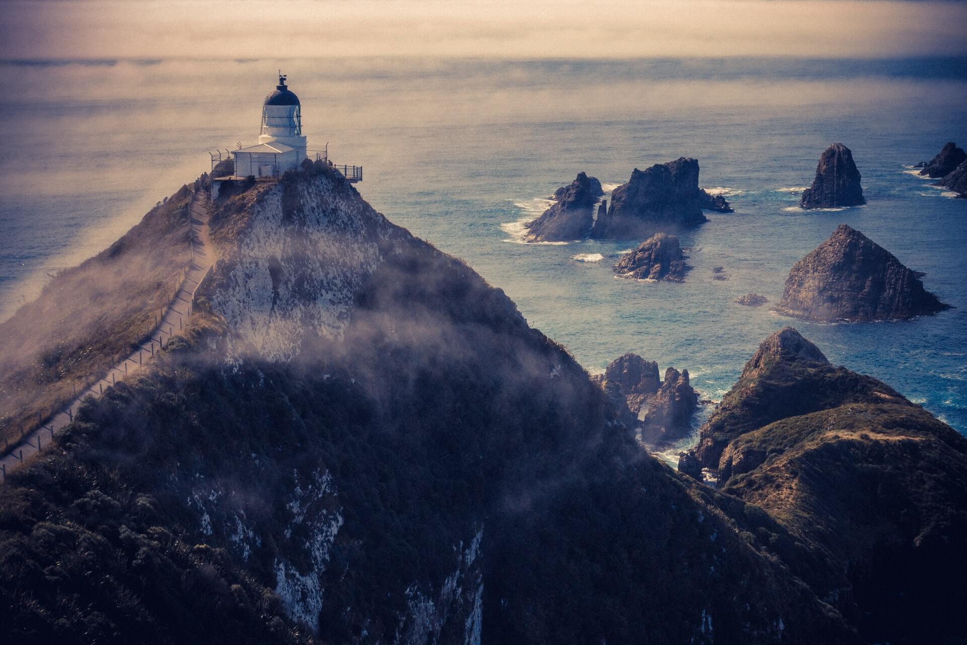 Nugget Point Lighthouse - famous point of interest on the South Island Southern Scenic Route drive
