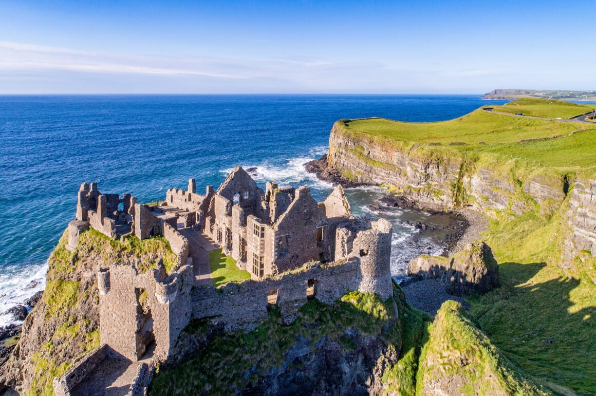 A castle found on the edge of a cliff facing the ocean while backpacking ireland alone. 