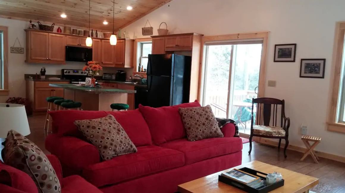 plush couch for lounging inside Adirondack Dream Airbnb
