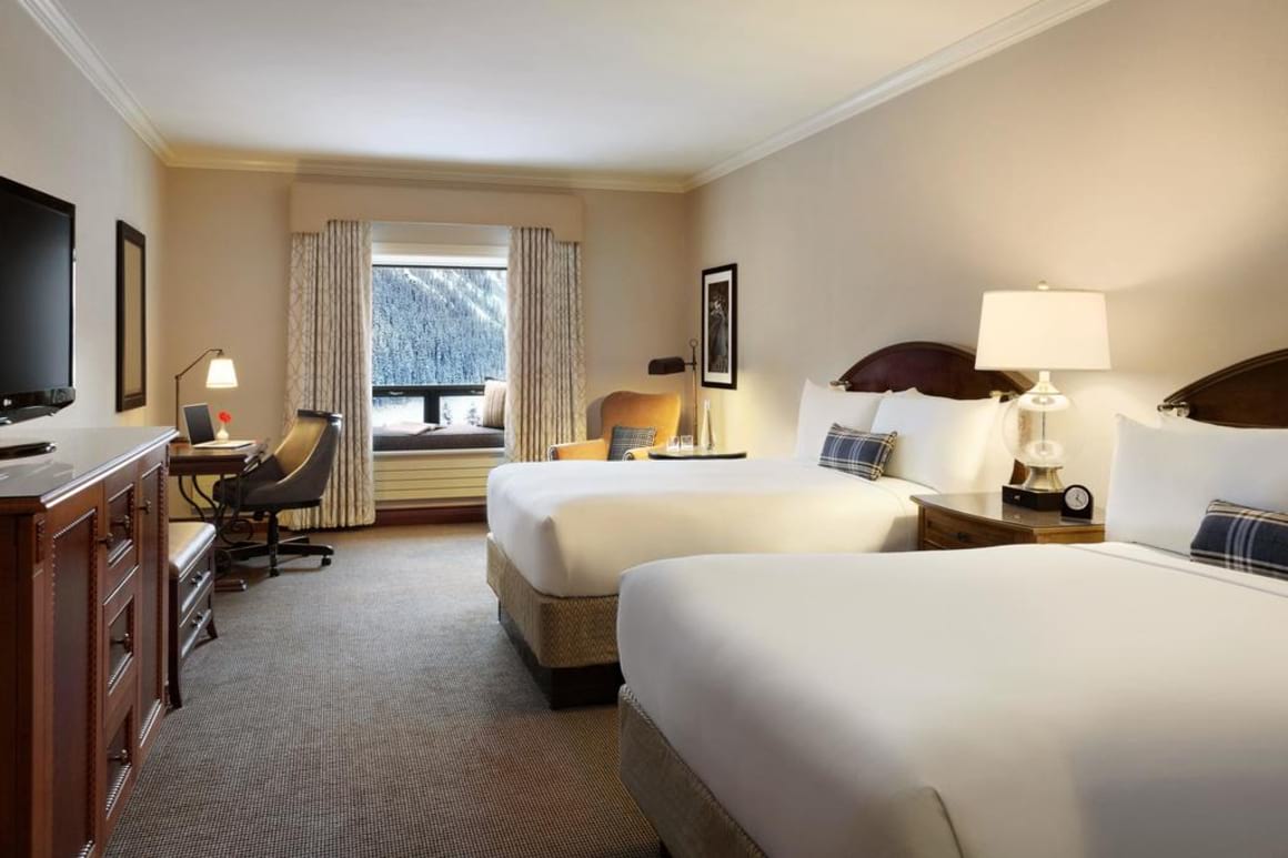 Luxurious big beds in a room in Fairmont Chateau Lake Louise