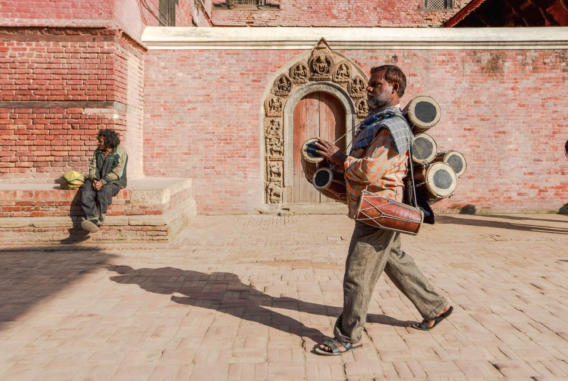 Drum merchant seen in a market while shopping in Kathmandu, Nepal