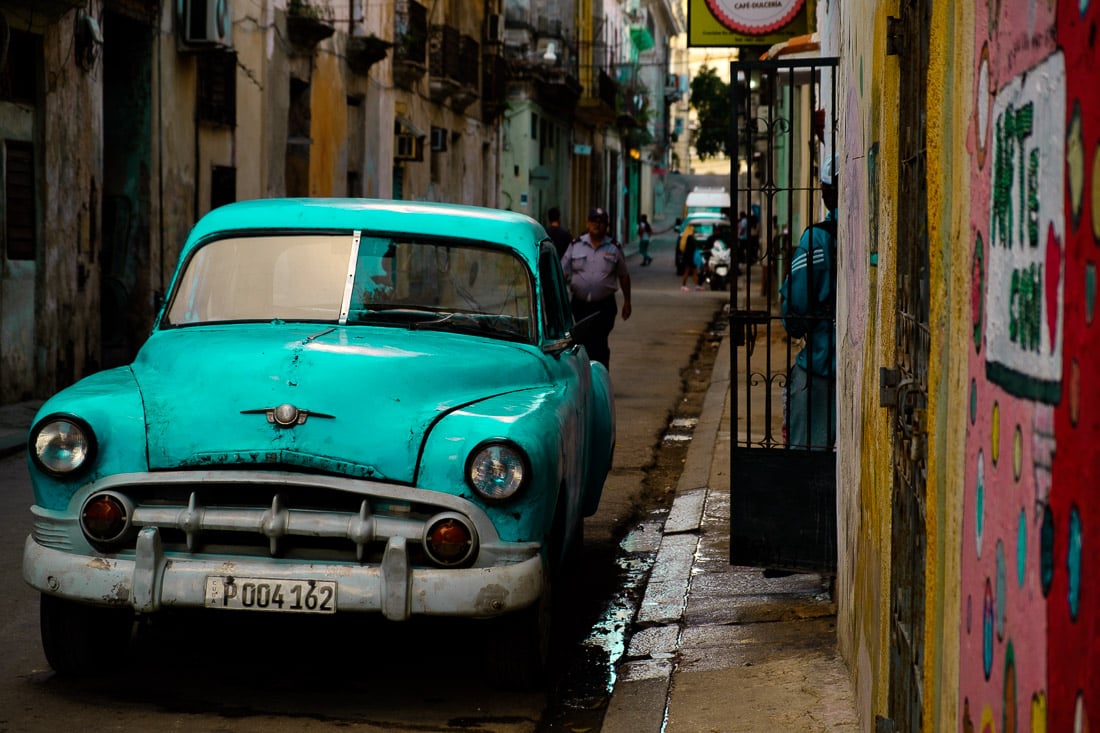 a classic car in the streets of havana, cuba